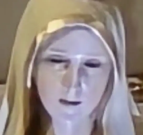 The statue appeared to close its eyes in the image. (Fox8)