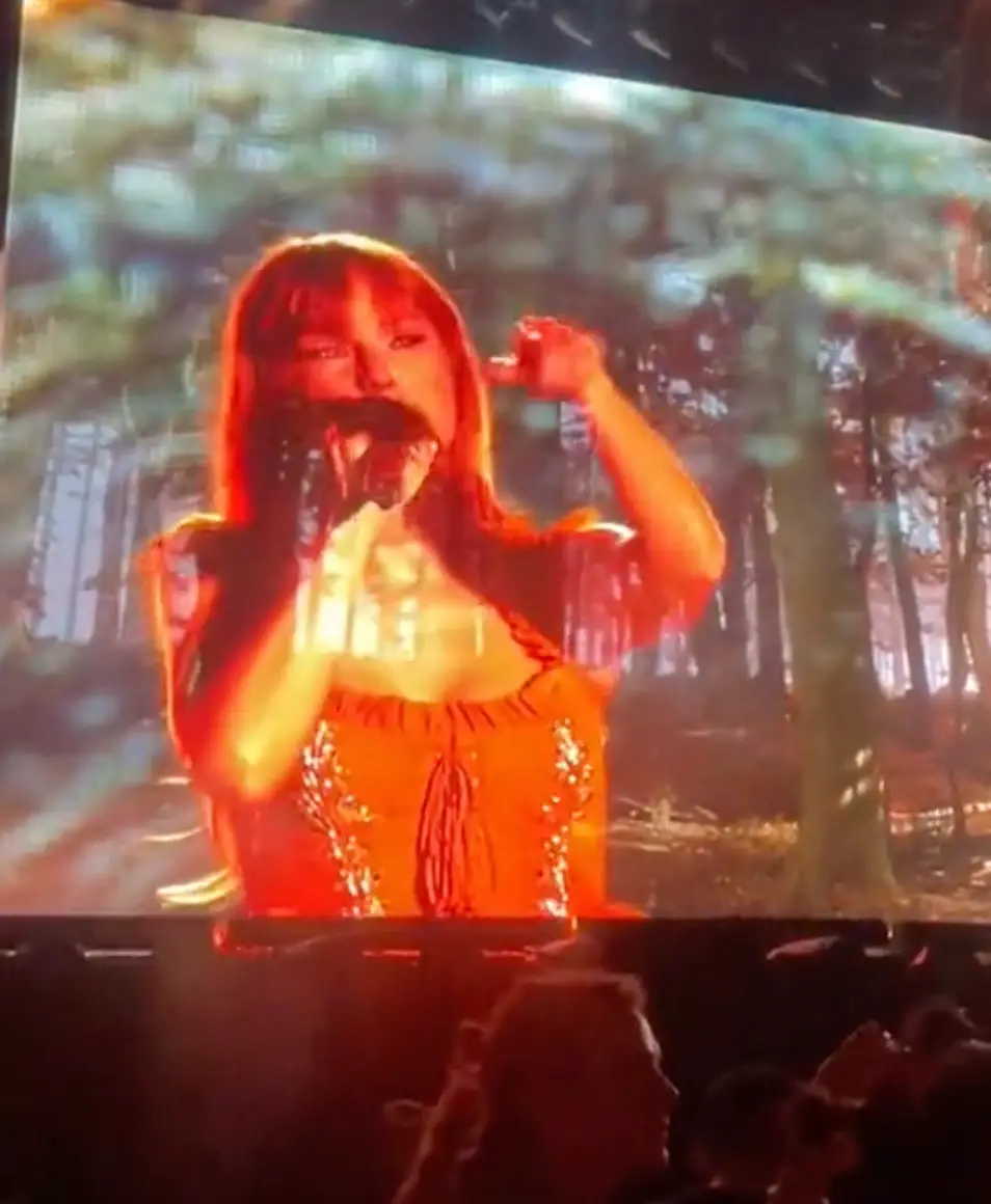 The singer appeared to well up during the performance.