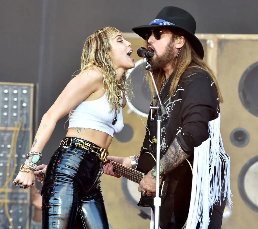 Billy Ray Cyrus performs with daughter Miley Cyrus at Glastonbury Festival in 2019 (Shirlaine Forrest/WireImage)