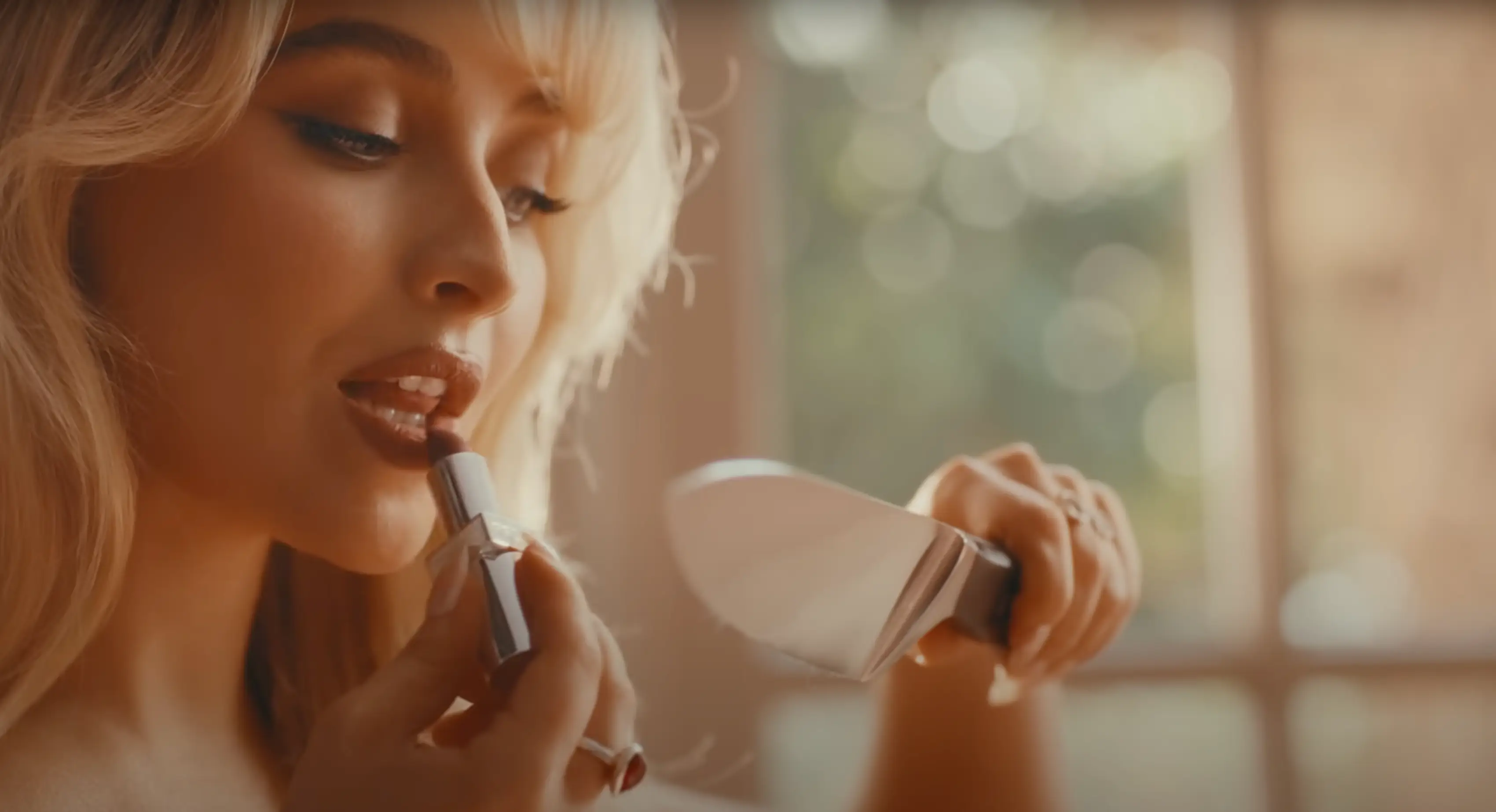 Sabrina Carpenter's latest music video is down right bad... in a cool way. (YouTube/Sabrina Carpenter)