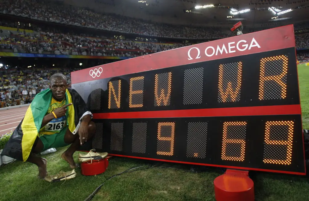 Usain Bolt after finding out he won his first gold medal at the Beijing 2008 Olympics (ADRIAN DENNIS/AFP via Getty Images)