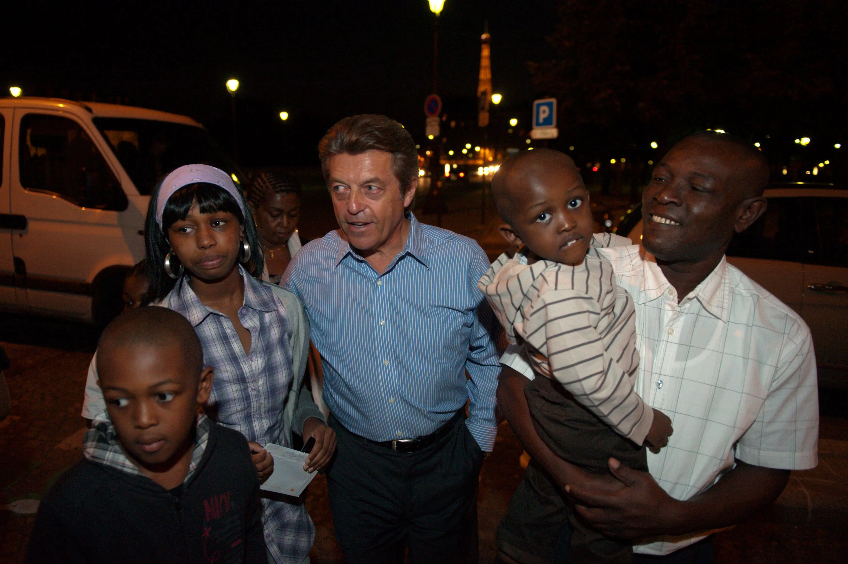 Bakari, her family and Alain Joyandet, minister of state in France.