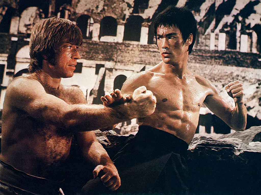 Chuck famously went toe to toe with Bruce Lee in The Way of the Dragon. (Screen Archives/Getty Images)
