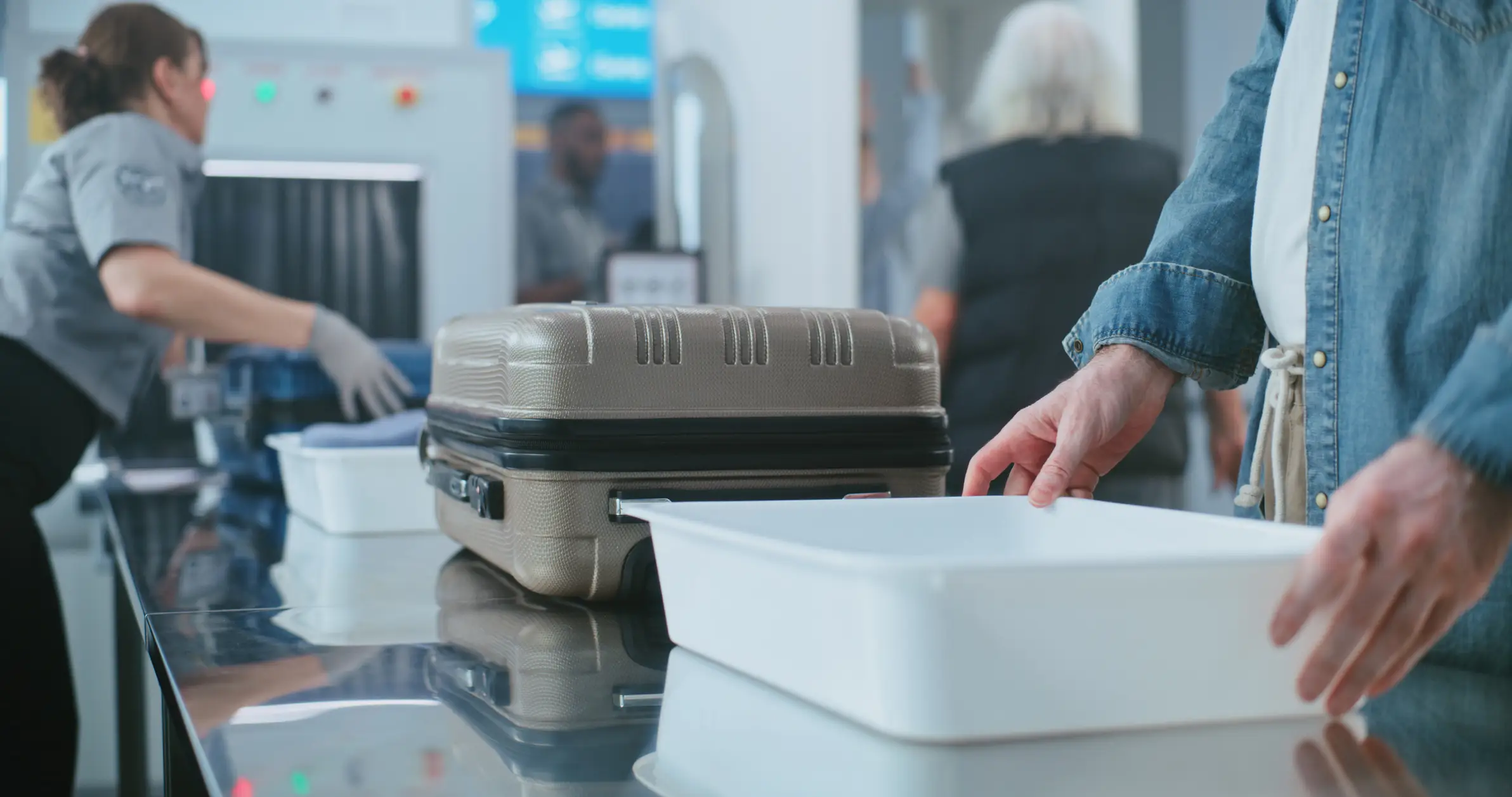 Going through security is one of the many unpleasant parts of air travel (Getty Stock)