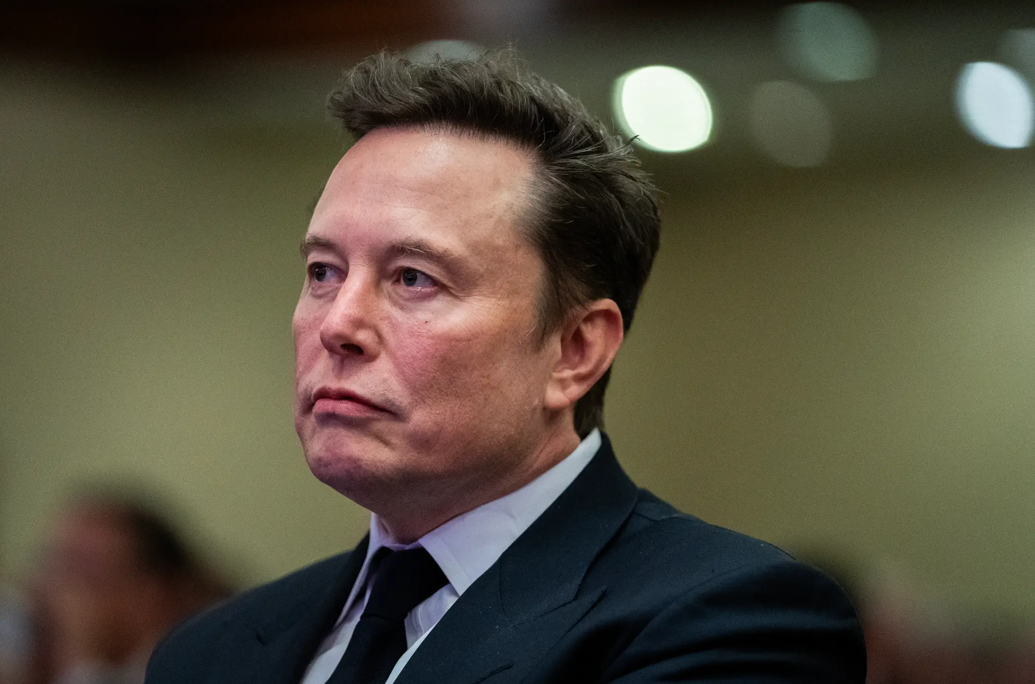 Tesla could have to make a hefty payout (Allison Robbert-Pool/Getty Images)