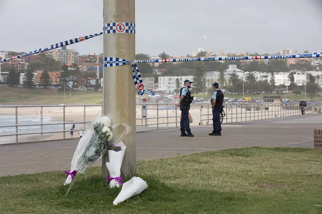 Tributes left at Bondi Beach (Brent Lewin/Bloomberg via Getty Images)