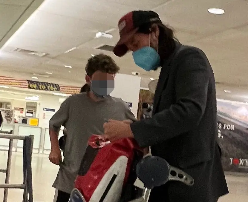 The fan was asking Reeves lots of questions.