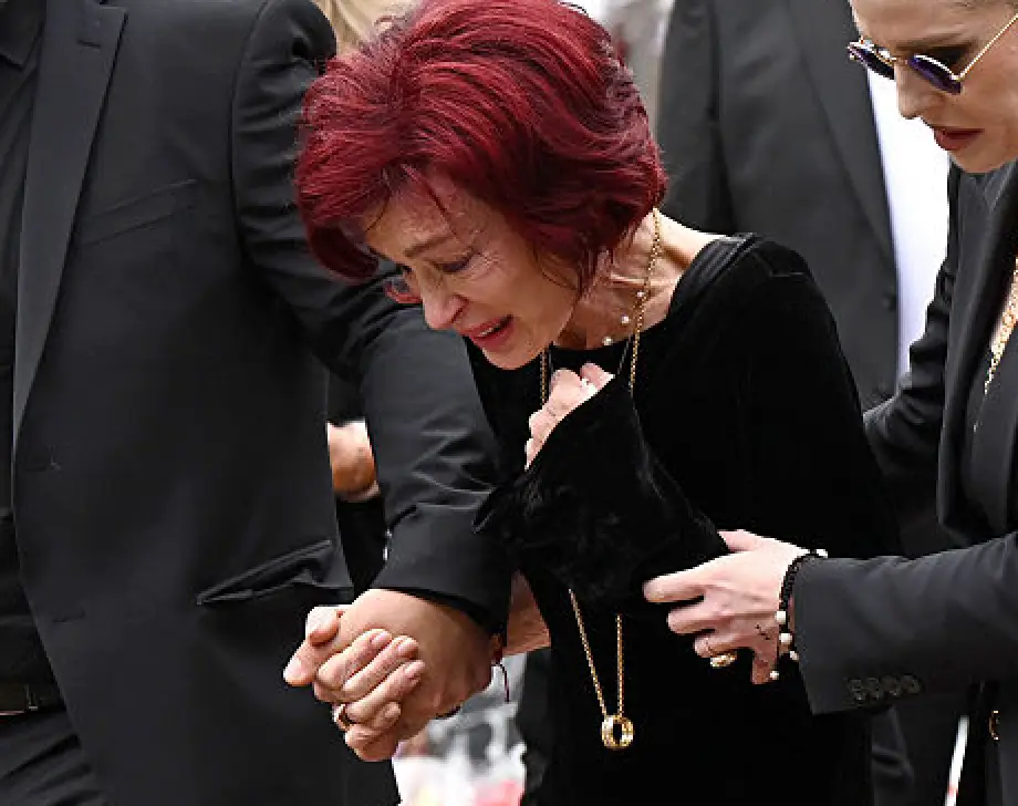 Sharon could be seen with the ring around her neck (Leon Neal/Getty Images)