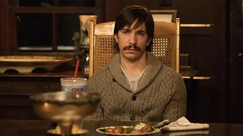 It features Justin Long.