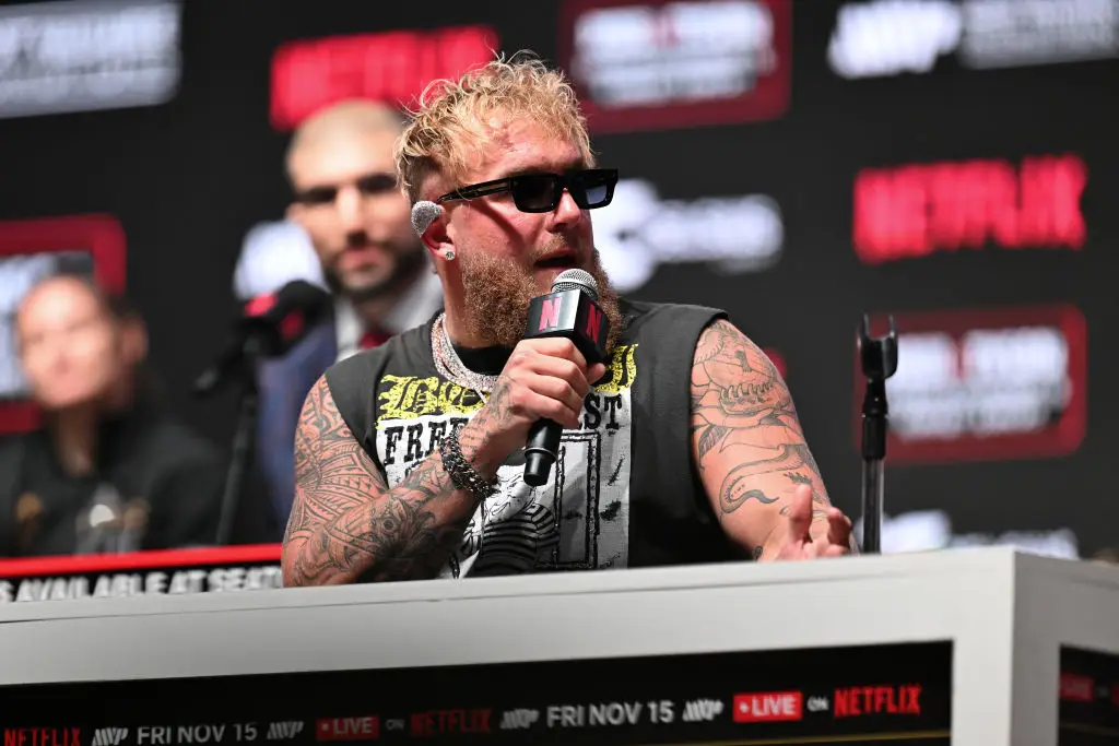 Jake Paul dons a $100,000 diamond-encrusted ear cover at a press conference before his bout against Mike Tyson (Tayfun Coskun/Anadolu via Getty Images)