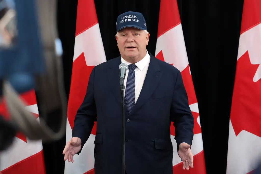 Ontario's Premier Doug Ford wearing a 'Canada Is Not For Sale' hat in January (David Kawai/Bloomberg via Getty Images)