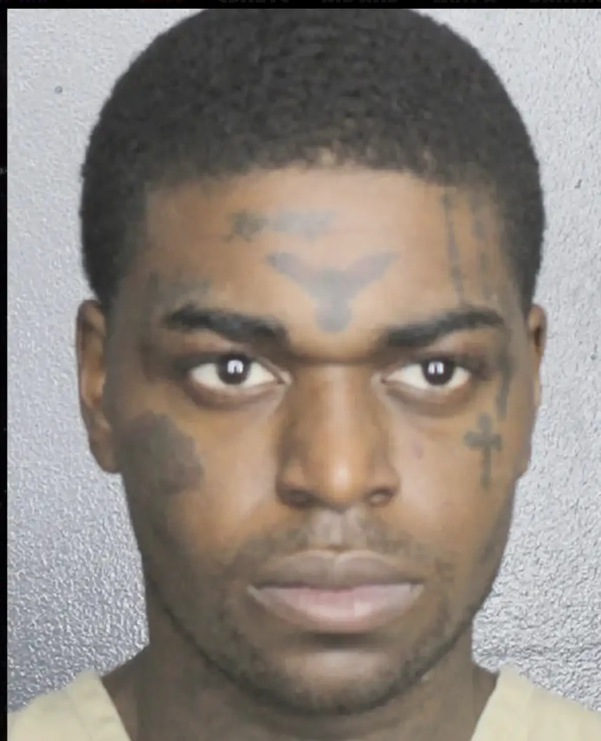 Kodak's mugshot from his arrest last month in Florida.