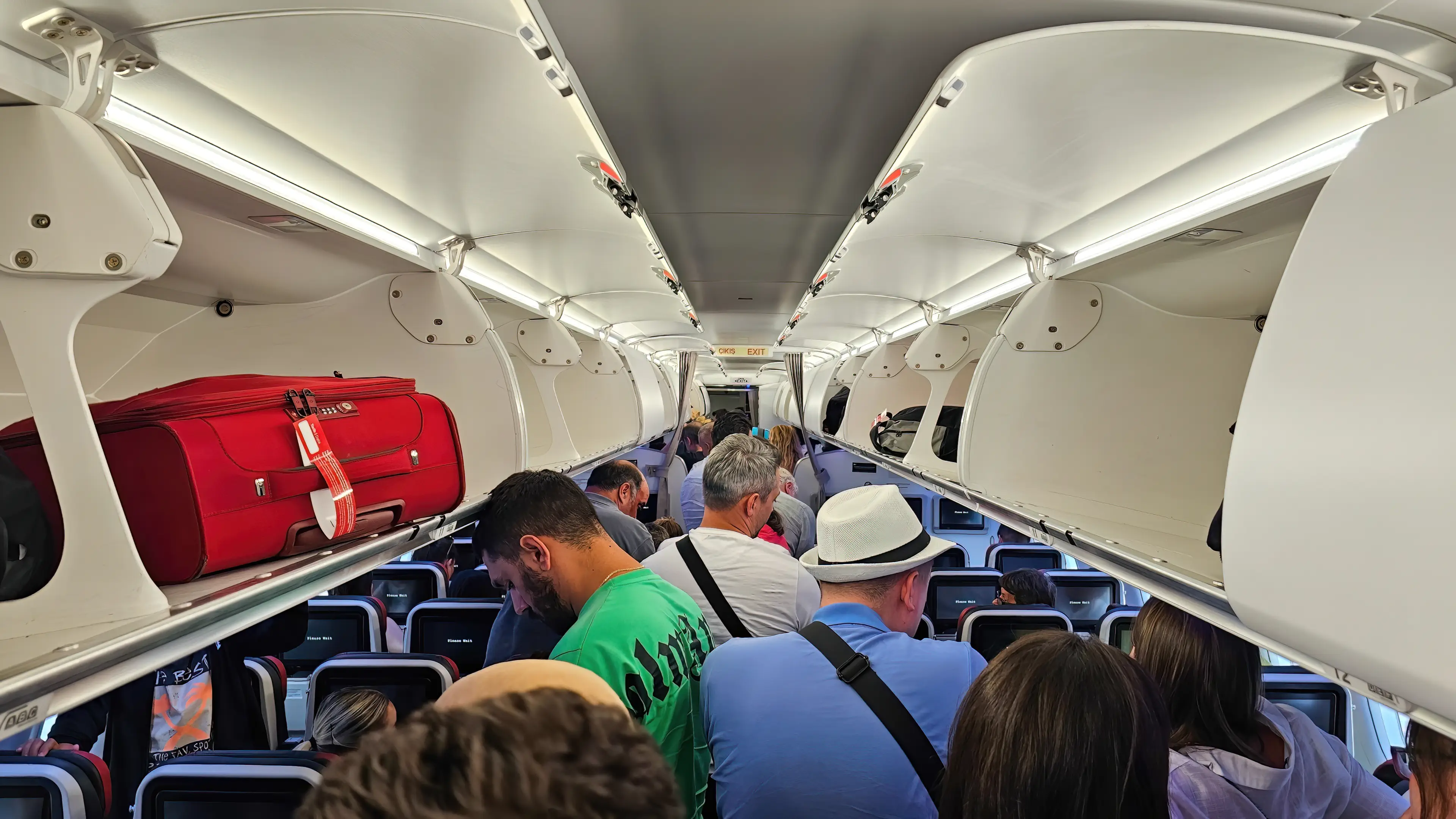 Many passengers can't wait to stand up after being sat down for a long-haul flight. (Getty Stock Images)