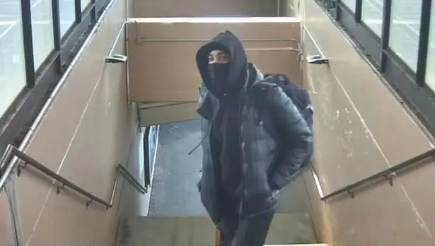 Zion Brown Suspect in Chicago Train Robbery on CCTV. (Police handout) 