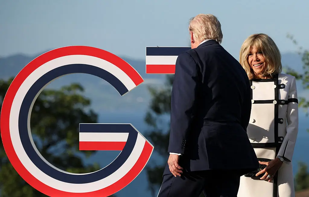 People are a bit confused over the way Donald Trump shook hands with Brigitte Macron (Isabel Infantes-Pool/Getty Images)