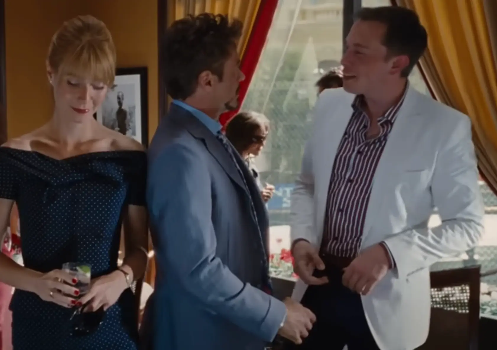 Tony Stark and Pepper Potts  bump into Musk and exchange pleasantries. (Paramount Pictures/ Walt Disney Studios Motion Pictures)