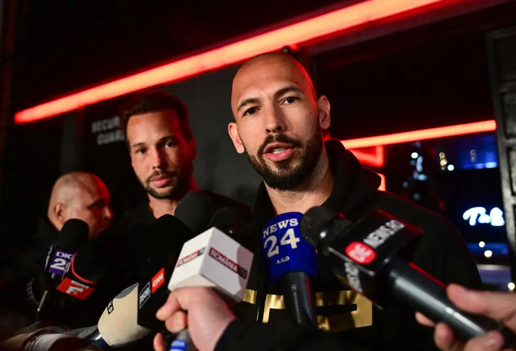 Andrew and Tristan Tate were arrested in Miami on July 18 amid ongoing extradition proceedings. (Photo by Daniel MIHAILESCU / AFP) (Photo by DANIEL MIHAILESCU/AFP via Getty Images)