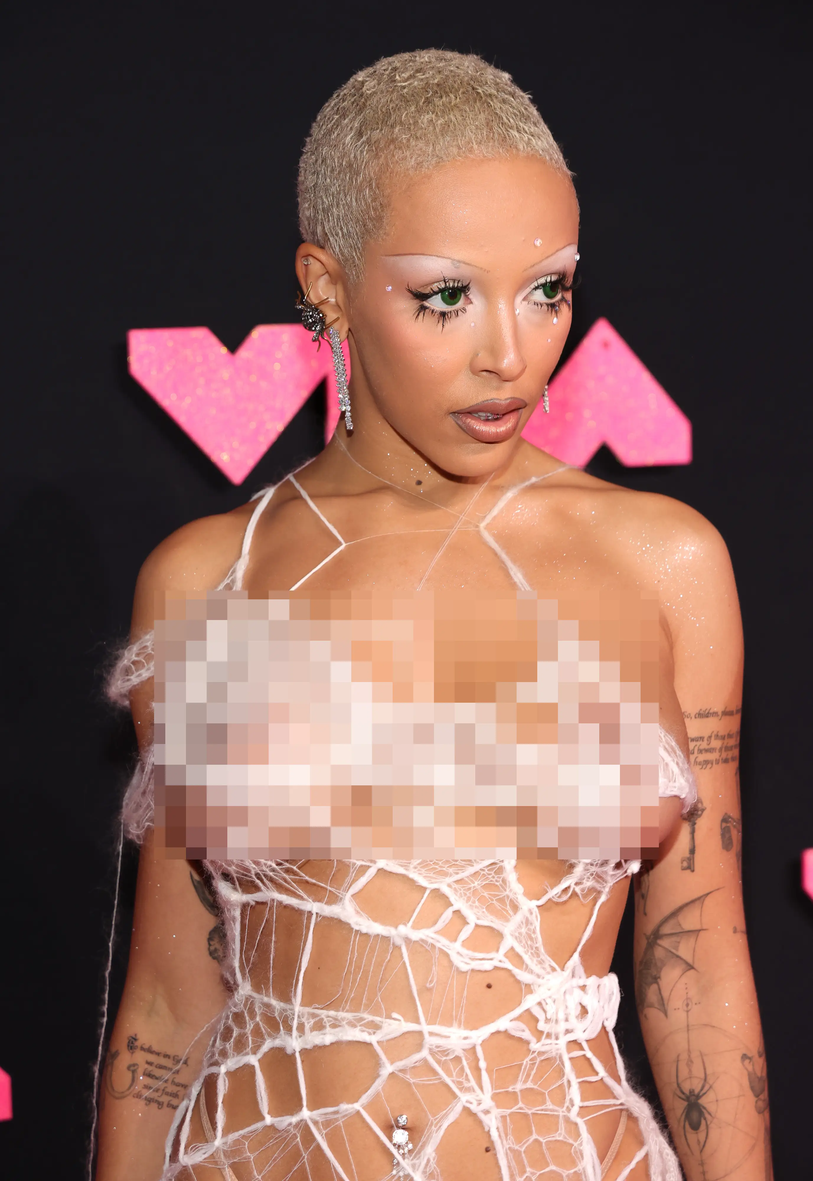 Doja Cat has us trapped in her web.