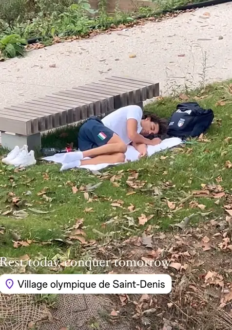 The swimmer was spotted napping beside a bench. (Instagram/huseinalireza)