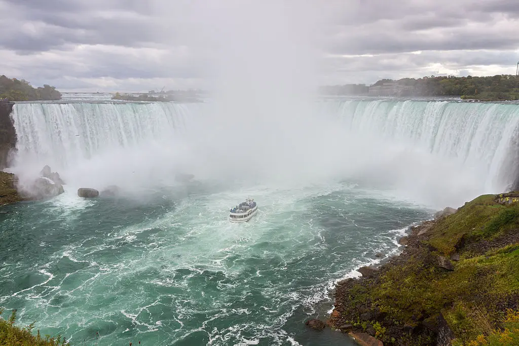 Goat Island is pictured at the top of Horseshoe Falls to the very left (ANUJAK JAIMOOK/Getty Images)