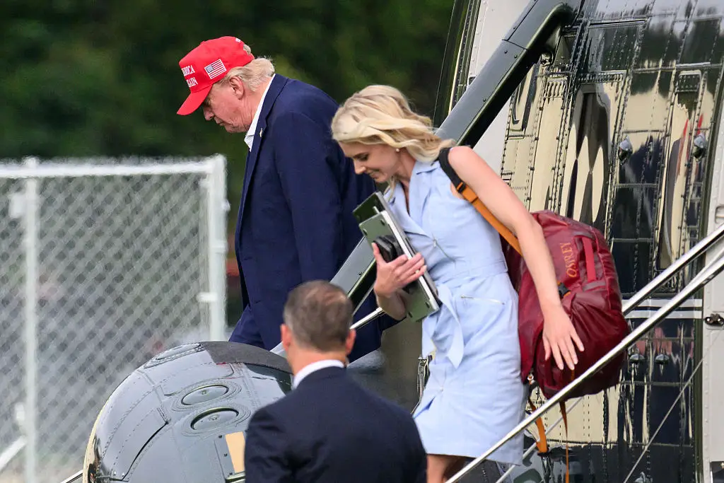 She was chosen to join him in the catering truck plane swap debacle. (Mandel NGAN / AFP via Getty Images)