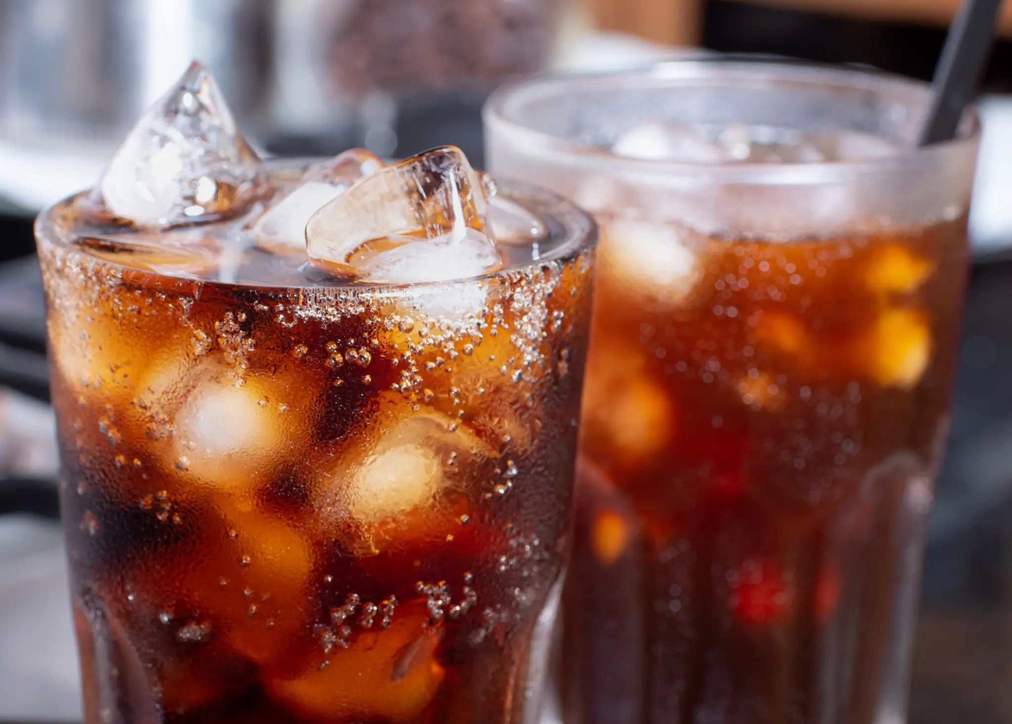 Excessive consumption of sugary drinks has a link to cancer (Getty Stock Image)