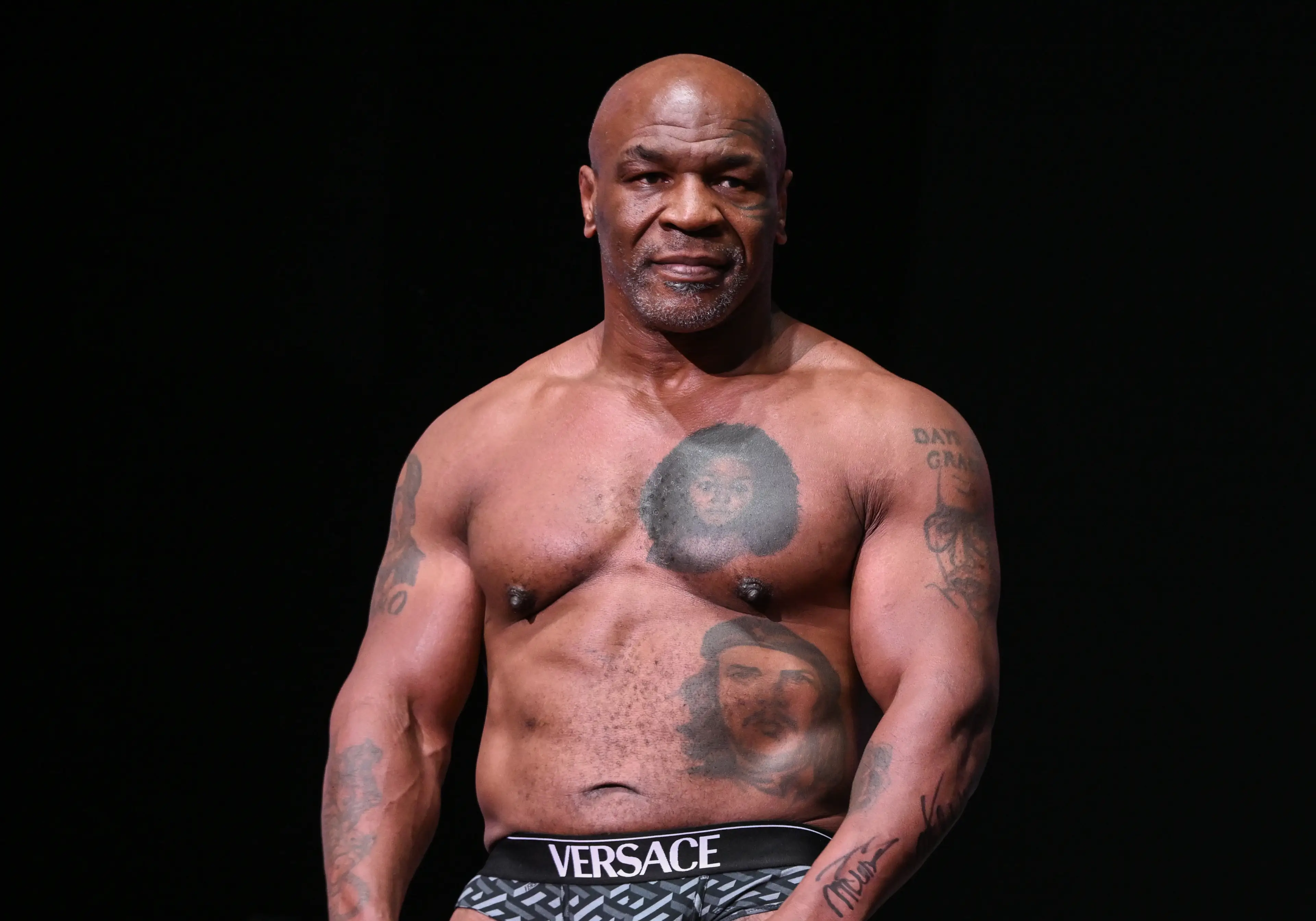Mike Tyson came in at 16st 4lb at last night's weigh-in (Tayfun Coskun/Anadolu via Getty Images)