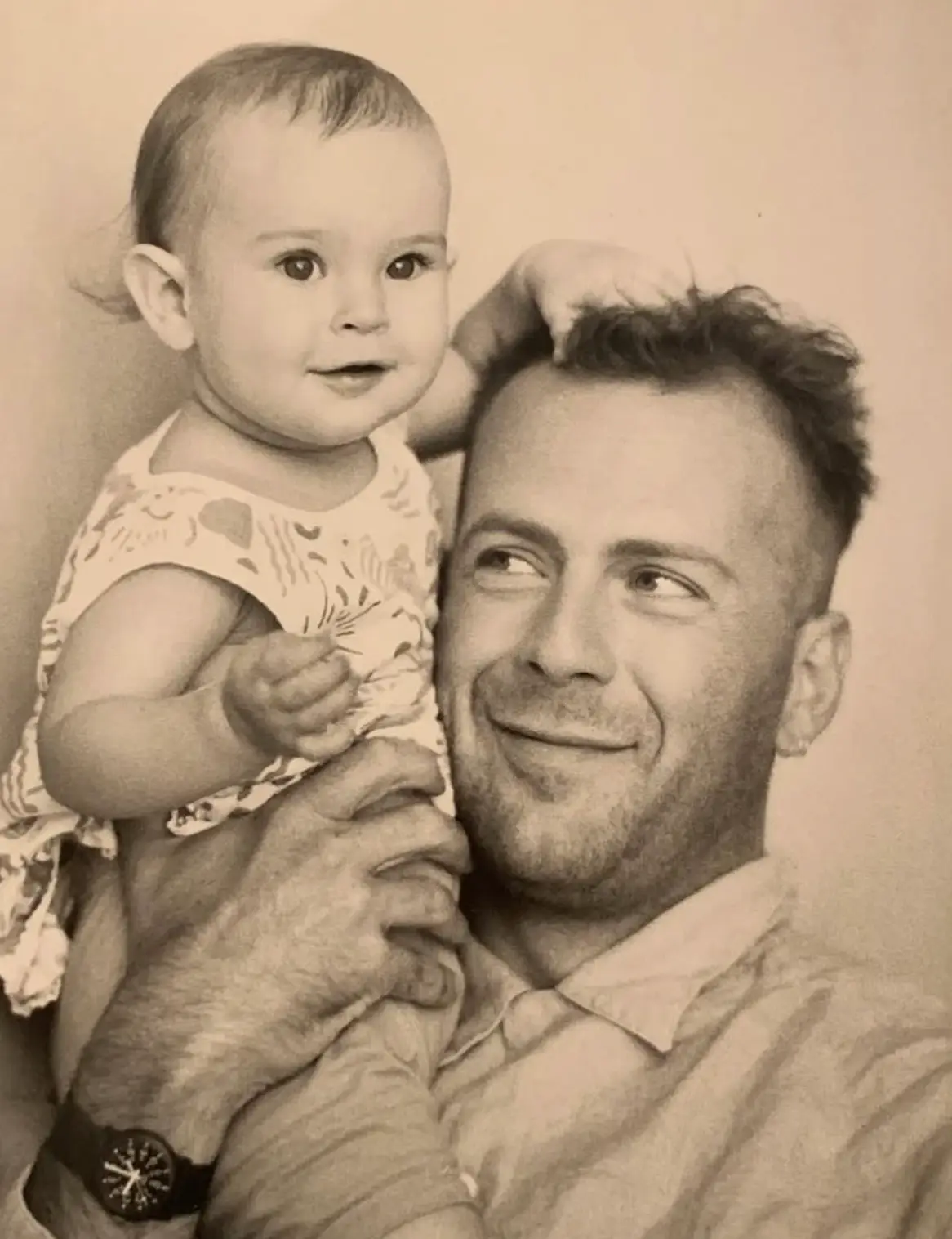 Rumer pictured with her famous dad when she was a baby (rumerwillis/Instagram)