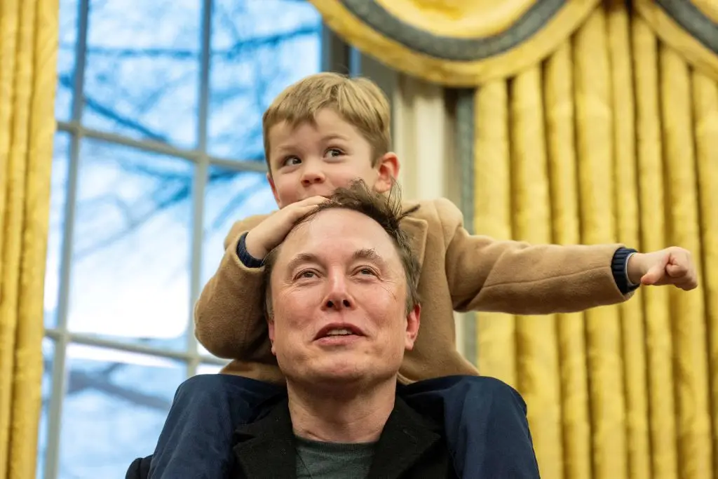 Musk and his son X Æ A-Xii in the Oval Office (JIM WATSON/AFP via Getty Images)