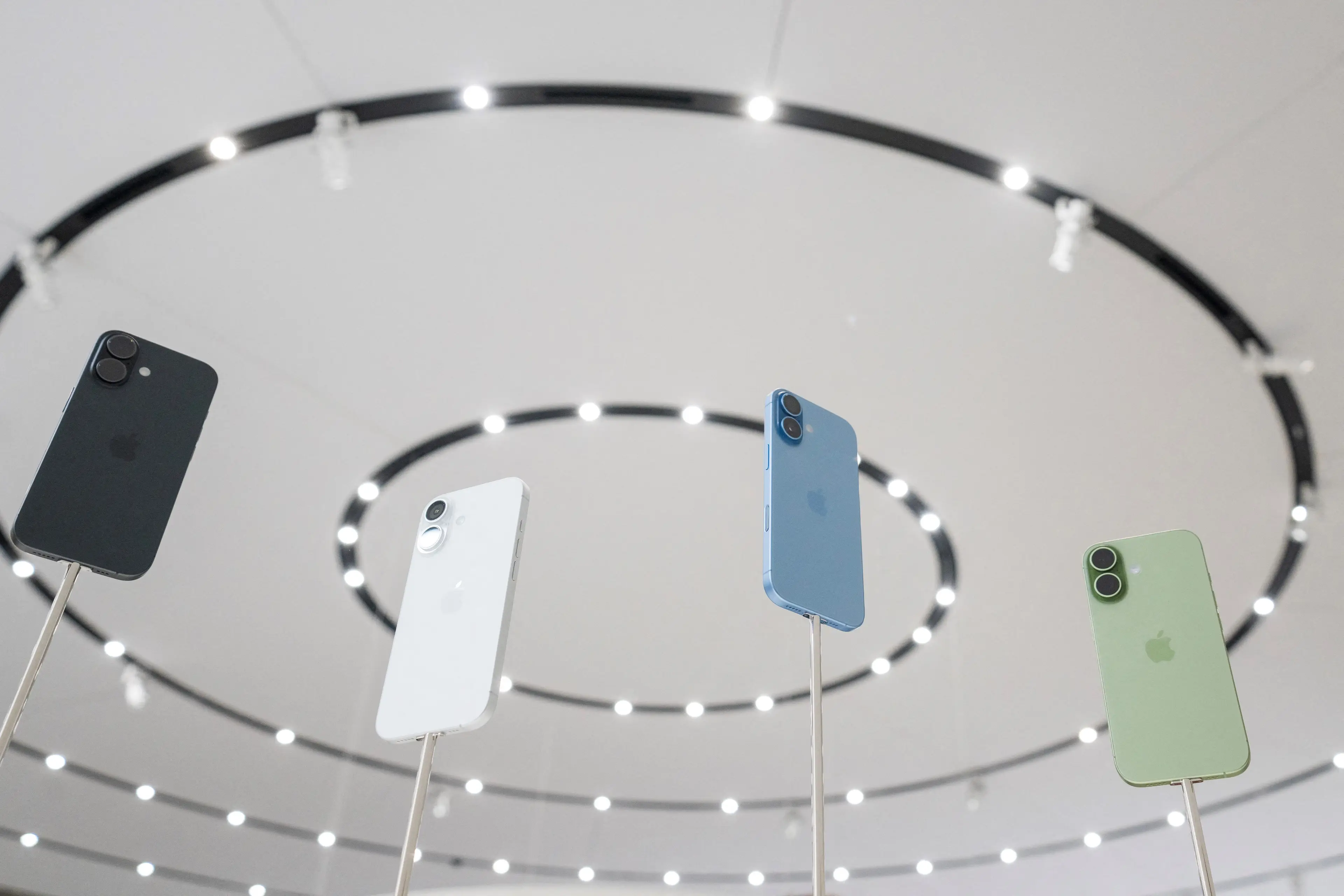 The new iPhone has an increased battery life and faster than ever charging time (Photo by NIC COURY/AFP via Getty Images)