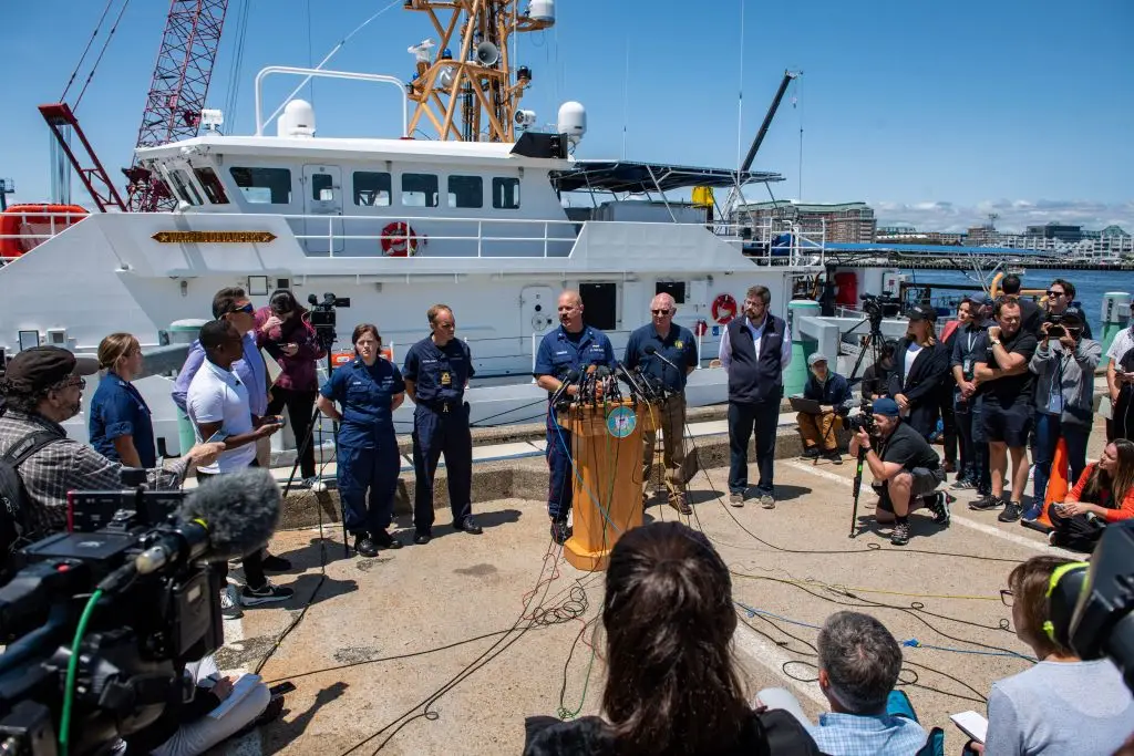 The US Coast Guard holding a press conference after the disaster (Photo by JOSEPH PREZIOSO/AFP via Getty Images)