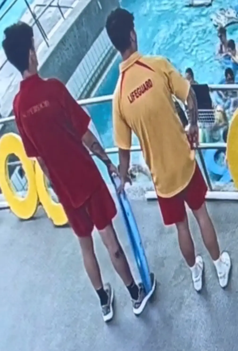 The lifeguard just before tossing the ring.