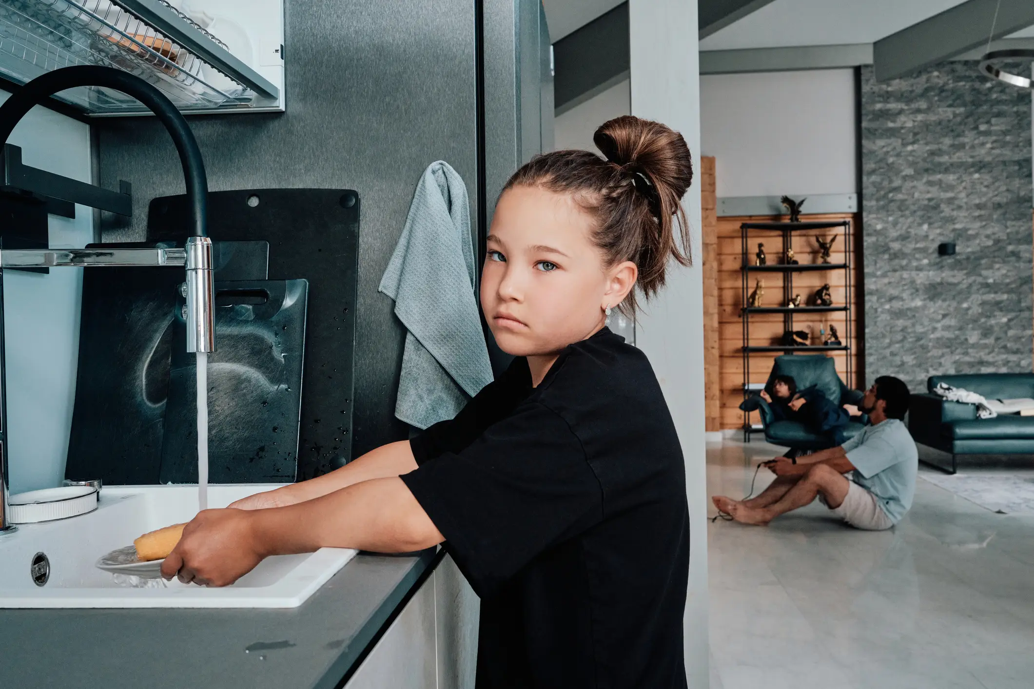 Kids can end up doing chores that their parents are supposed to be doing (Getty Stock)