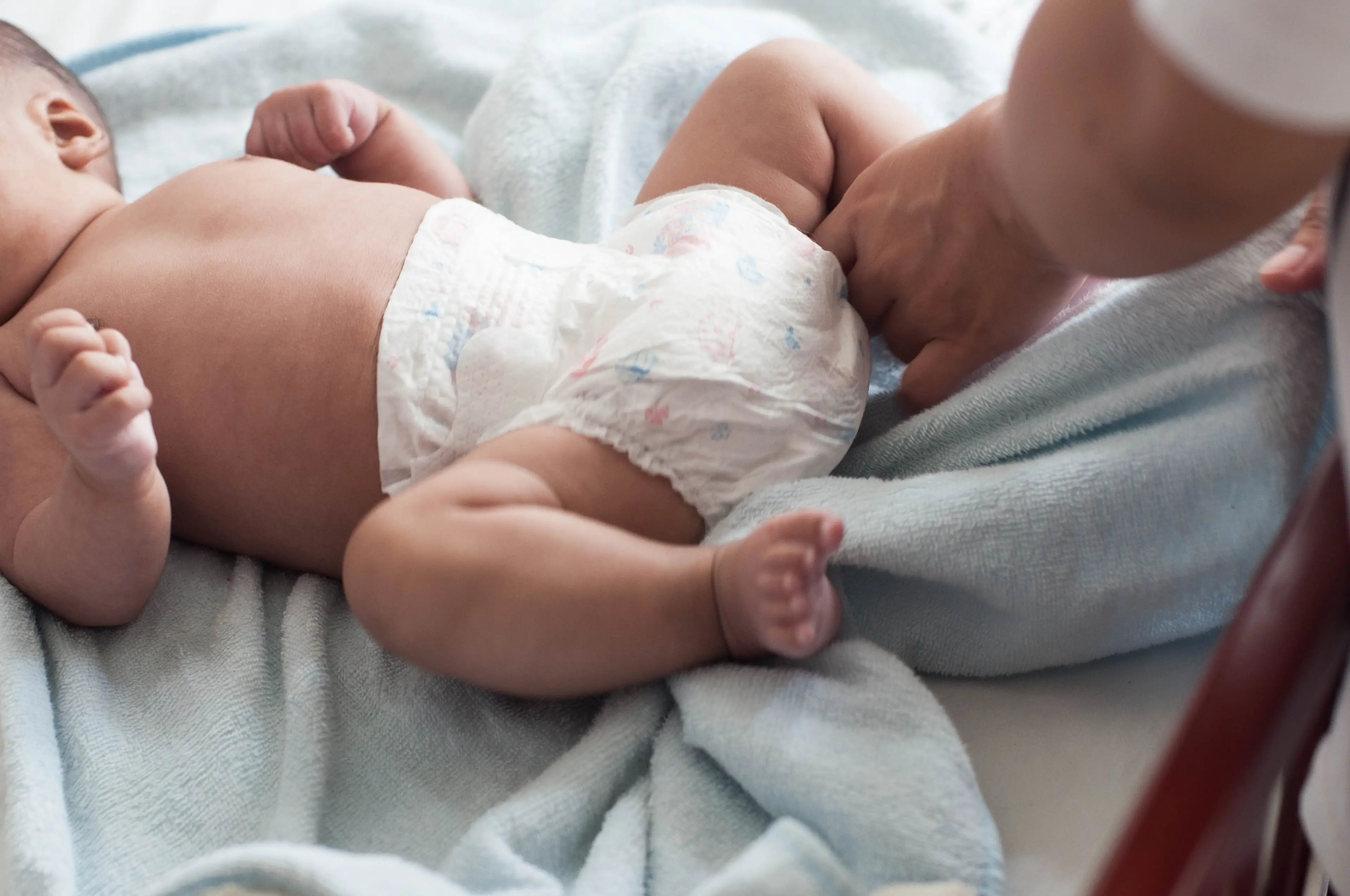 Some believe a baby must consent to having their diaper changed. (Getty Stock)