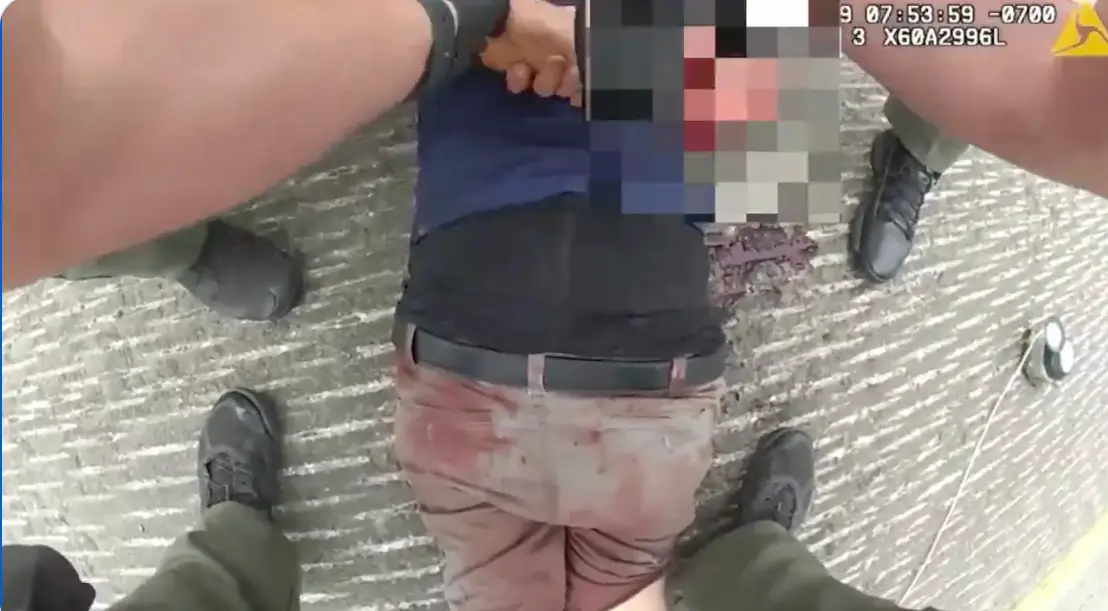 The assailant was seen with bloodied clothing. (OC Sheriff/YouTube)