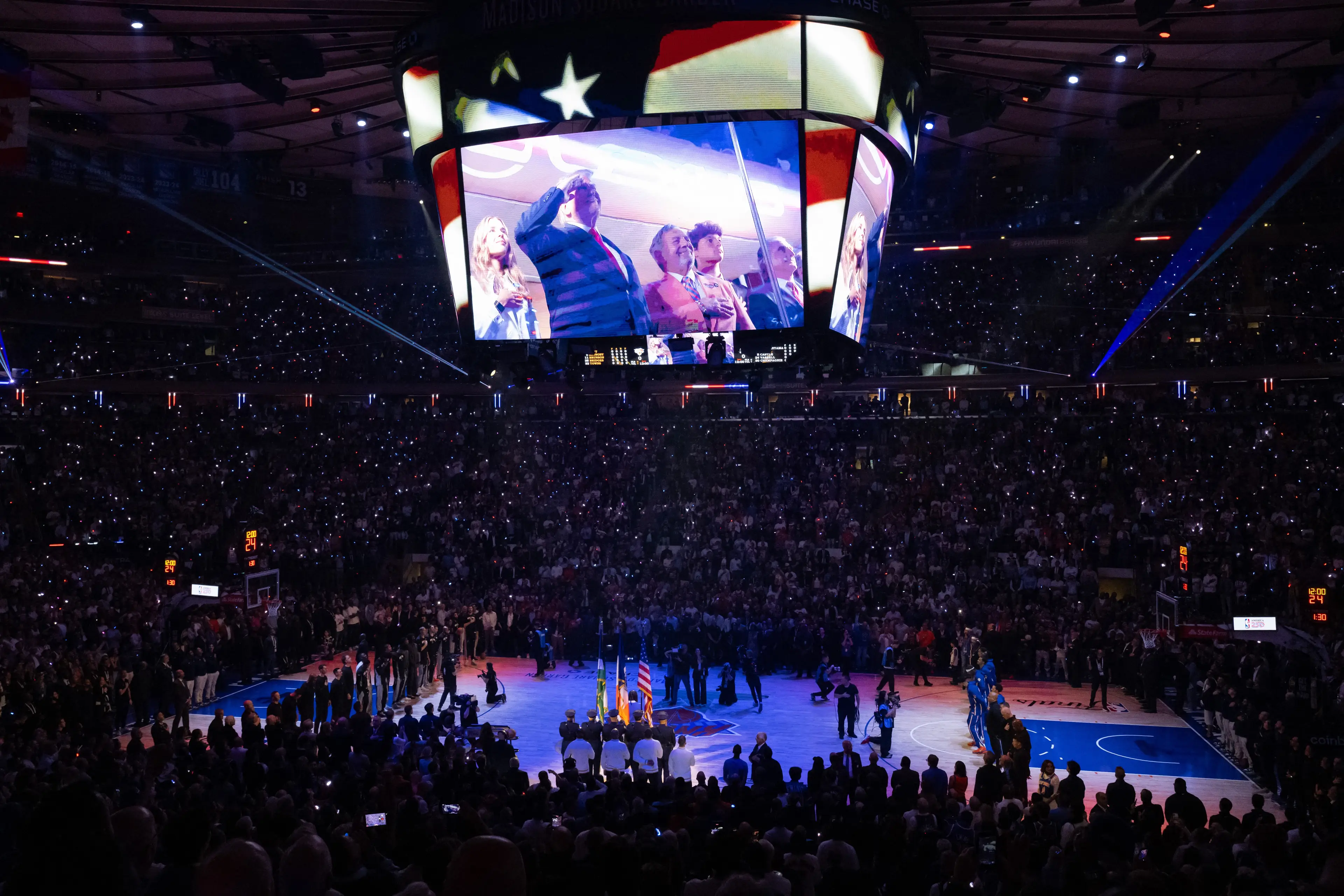 Trump appeared on the jumbotron (SAUL LOEB / AFP via Getty Images)