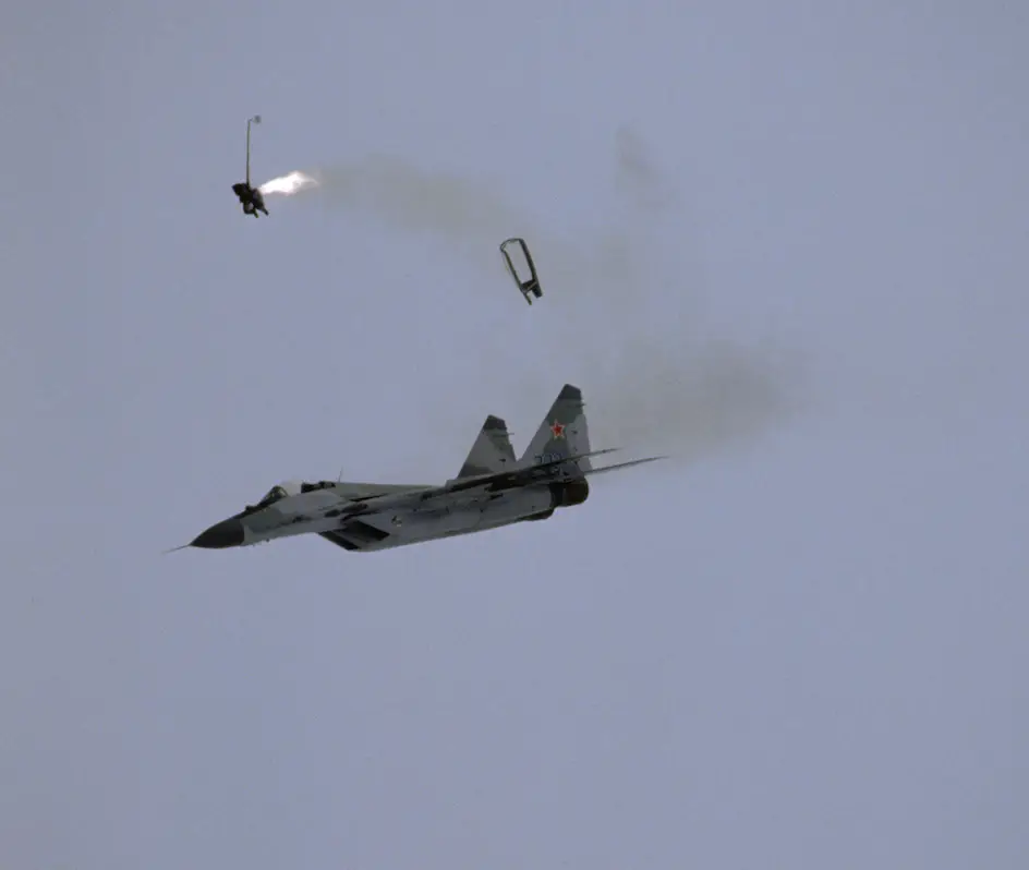 A pilot ejected from his jet and landed in an unsuspecting civillian's yard. (Alain Nogues/Sygma/Sygma via Getty Images)