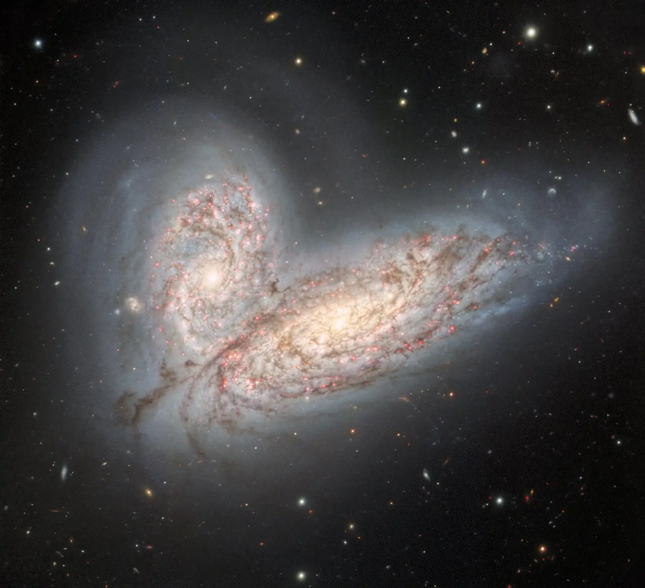 This image was captured last year and shows two spiral galaxies -  NGC 4568 and NGC 4567 - crashing into each other.