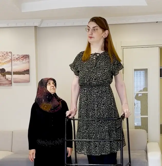 Rumeysa struggles to move around her home.