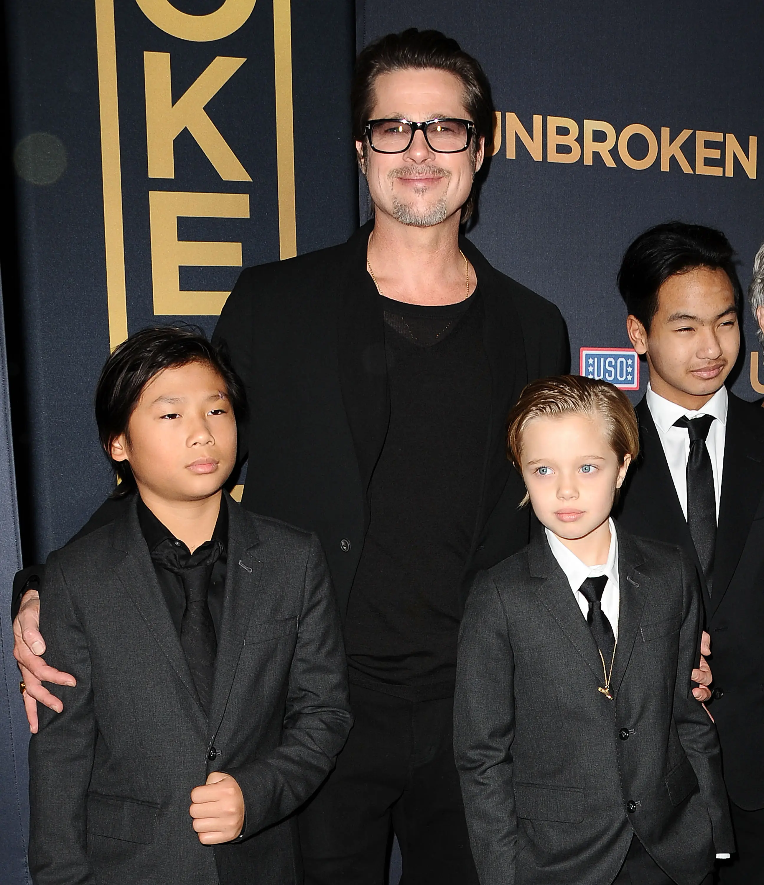 Pitt pictured with his children Pax, Shiloh, and Maddox in 2014 (Jason LaVeris/FilmMagic)