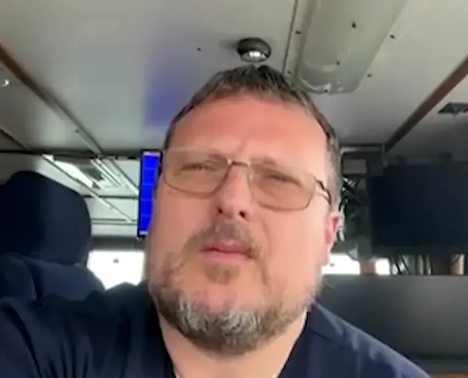 Captain Adam White says Derek was freezing cold when they got to him due to the water's conditions (YouTube/NBC News)
