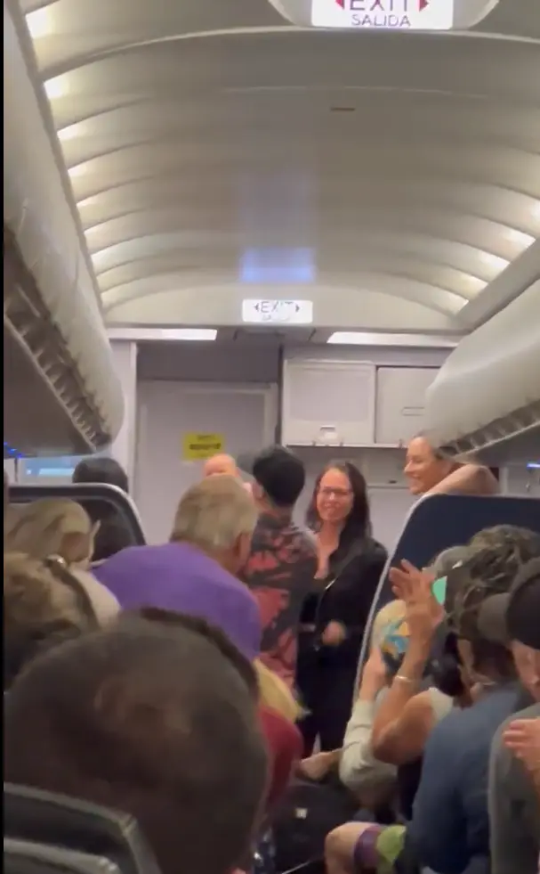 The crowd applauded as the baby started breathing again.