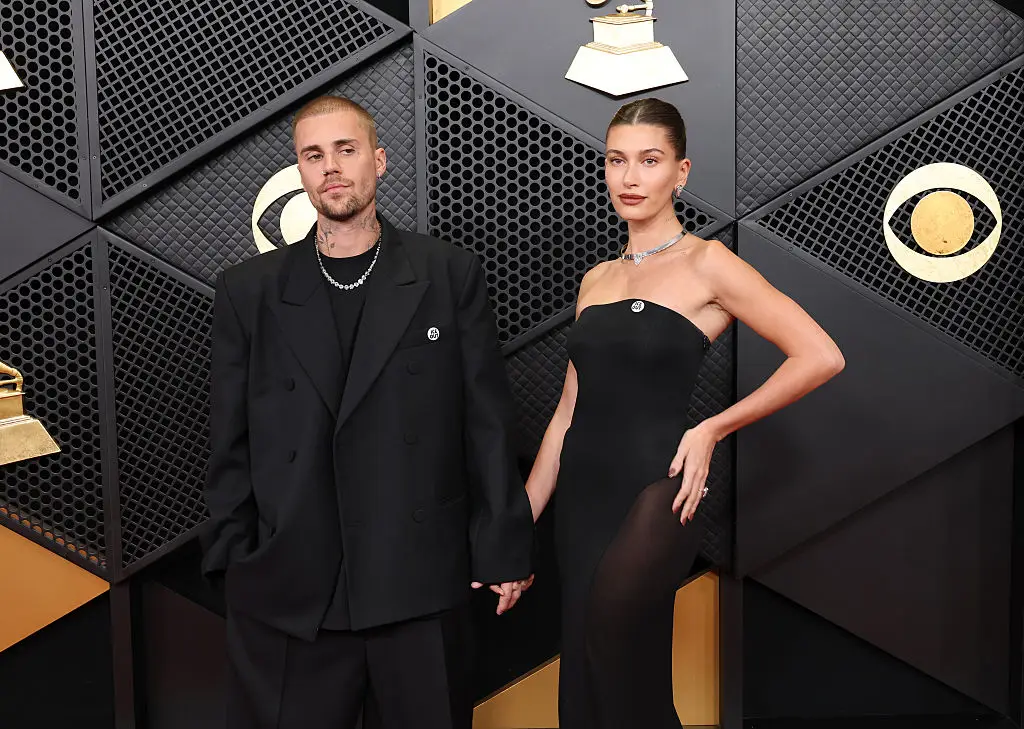 The Biebers wore their 'ICE OUT' pins on the red carpet and through the ceremony. (Amy Sussman / Staff / Getty)