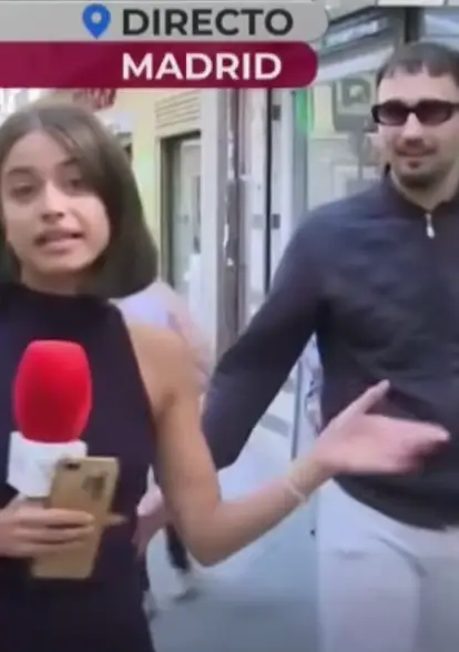 A man interrupted the live broadcast by allegedly touching Balado's behind.