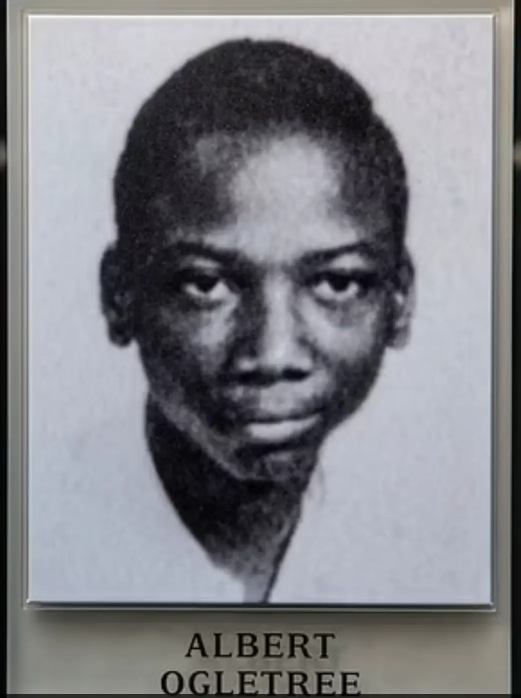 After years of searching, the man's yearbook picture was finally located.