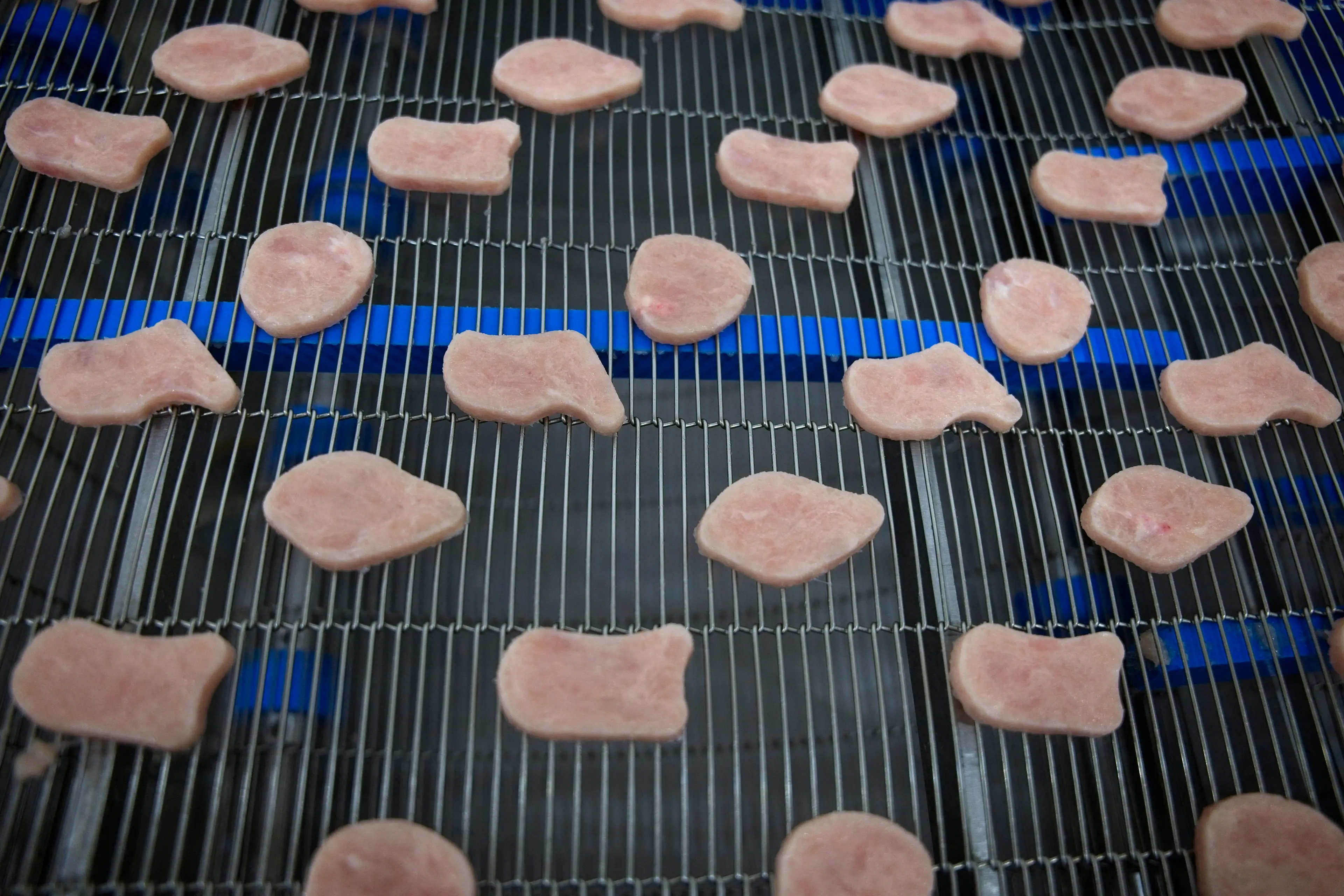 Chicken nuggets being manufactured in France at a central unit. (GUILLAUME SOUVANT/AFP via Getty Images)