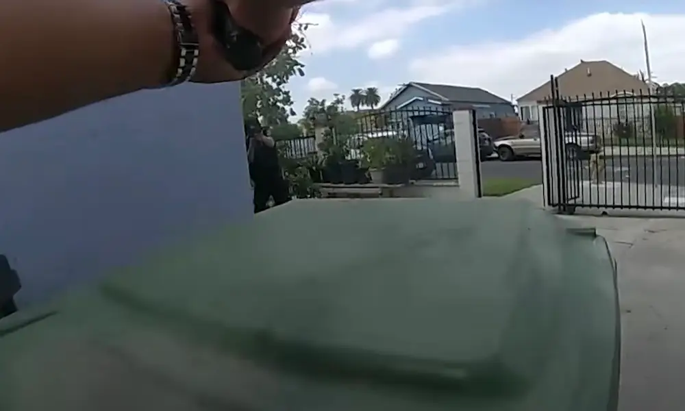 The 19-year-old came out of the house with what appeared to be an assault rifle.