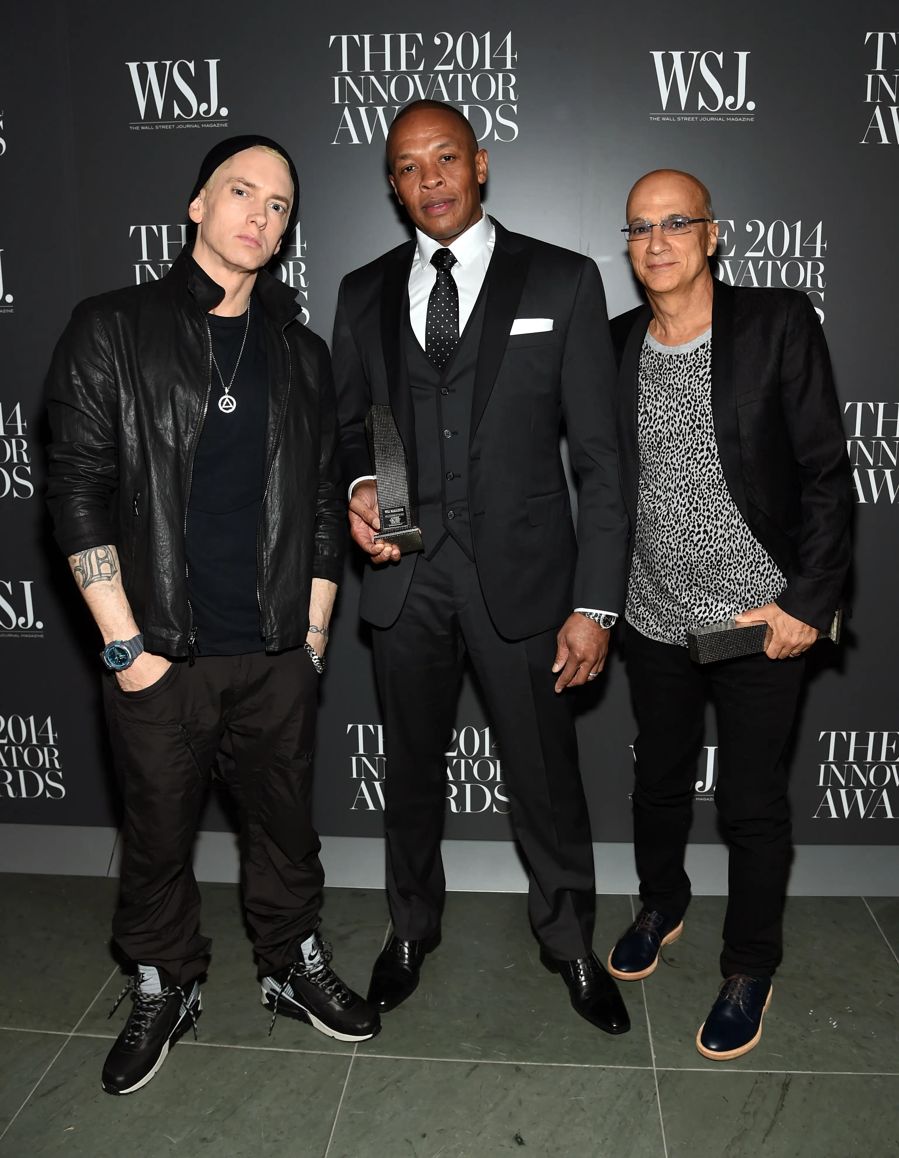 The rapper pictured with Dr. Dre and Jimmy Iovine in 2014.