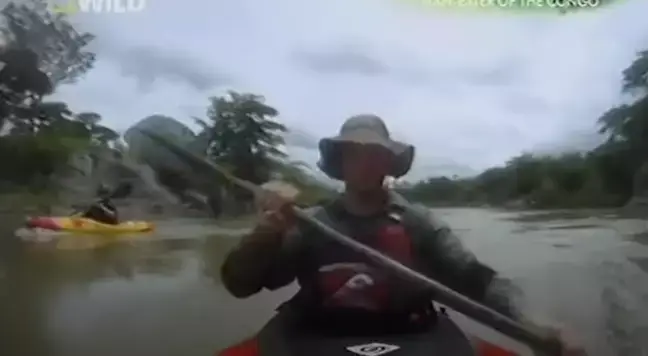 Two kayakers caught the horrific moment their friend was eaten by an enormous crocodile on camera (National Geographic)