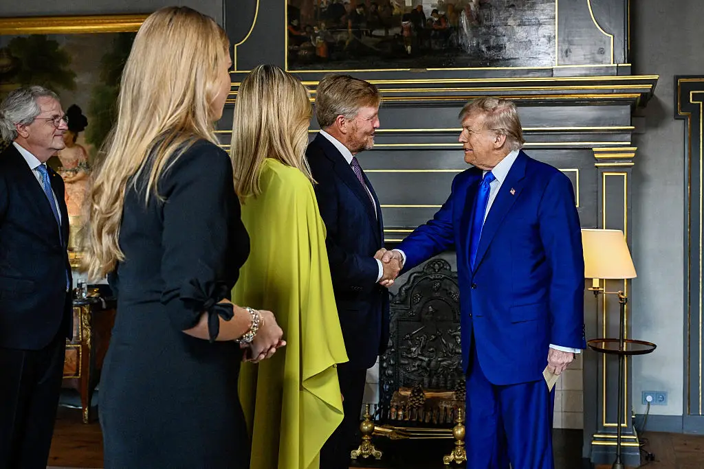 The body language expert explained Trump was happy to meet King Willem-Alexander (MISCHA SCHOEMAKER/POOL/AFP via Getty Images)
